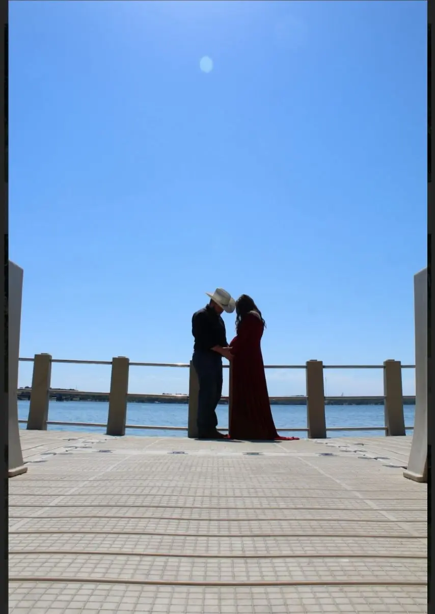 Wedding ceremony at a scenic waterfront dock